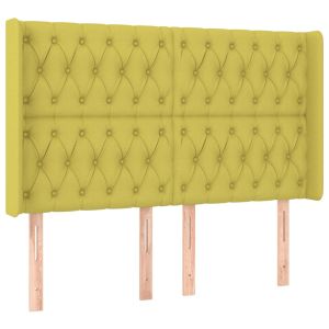 Hoofdbord met randen 147x16x118/128 cm stof groen